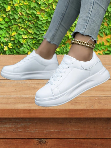 Lage leren sneakers met dikke zool